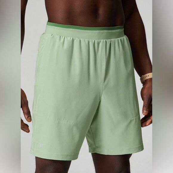 Fabletics Men’s The Fundamental Short II 7in Green Activewear Athletic Wear - Picture 1 of 8